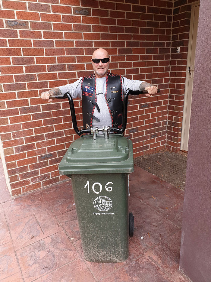 Australians-Dress-Up-Taking-Bins-Out