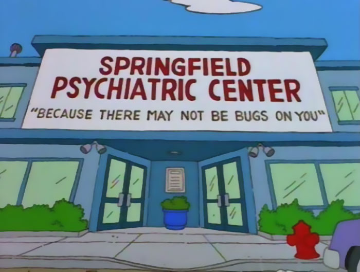 Sign at Springfield Psychiatric Center reading because there may not be bugs on you from Simpsons witty signs collection.