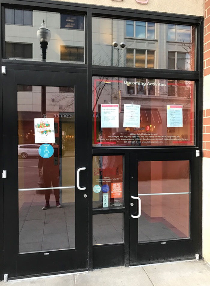 This Door To A Children's Science Museum Has A Smaller Door For The Kids