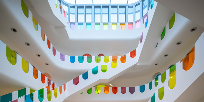 483 Rainbow-Colored Glass Panels Emit A Rotating Kaleidoscope In This Playful Kindergarten
