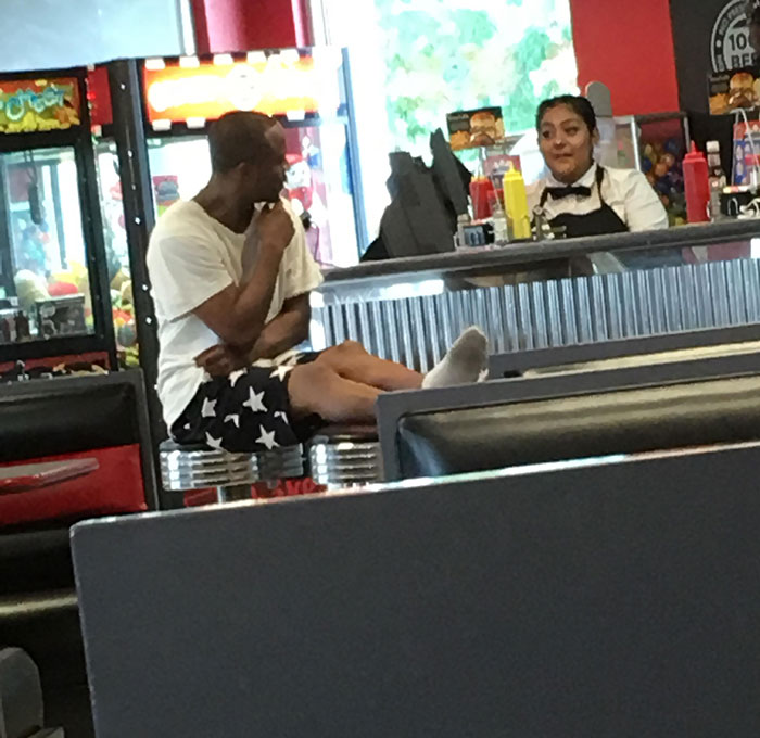 Taking His Shoes Off In The Restaurant And Taking Up Free Seats