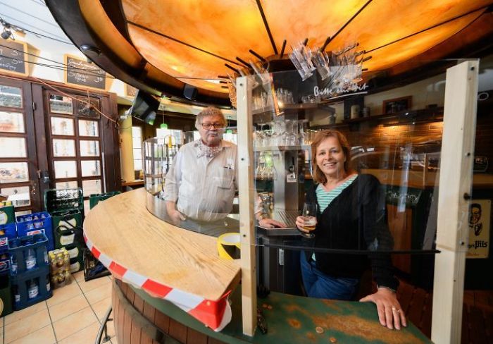 Bar In Germany Installed A Spit Guard Between Patrons And Employees