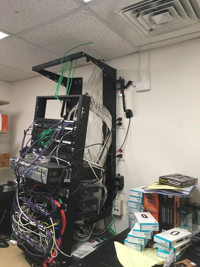 Single Cat5 Cable Holding Up A Rack