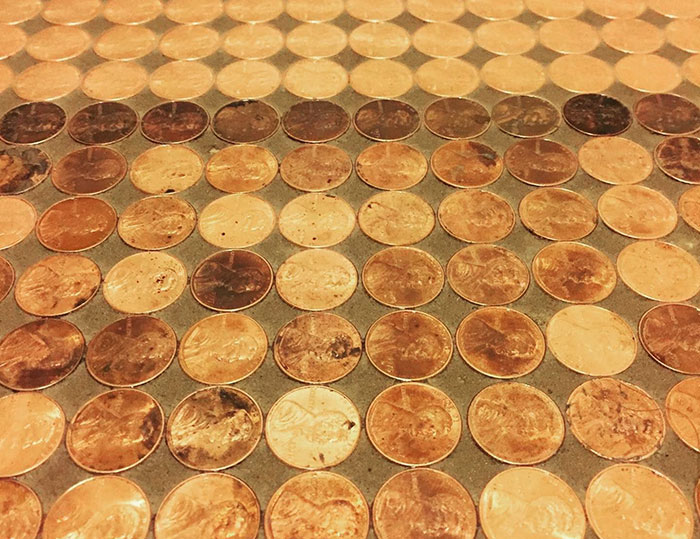 Artist Works On A DIY Project To Create This Stunning Mosaic Floor Out Of 7,500 Pennies