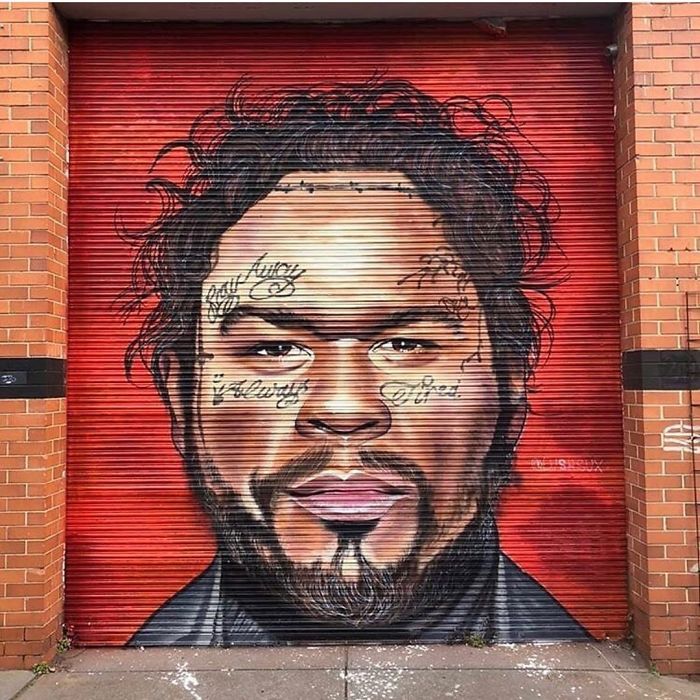 This Street Artist Can't Stop Trolling 50 Cent And The Rapper Is Getting Increasingly 'Irritated' By It