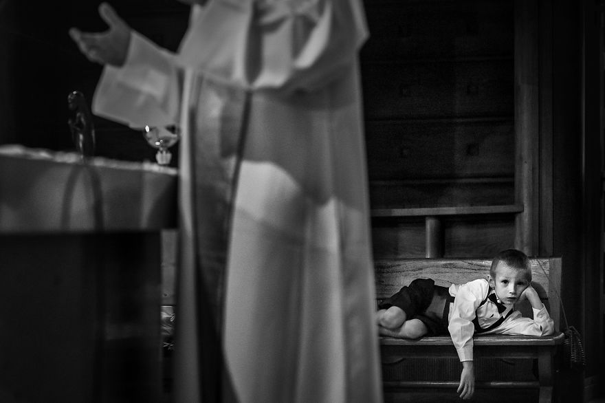 This Little Man Getting Comfortable During Mass