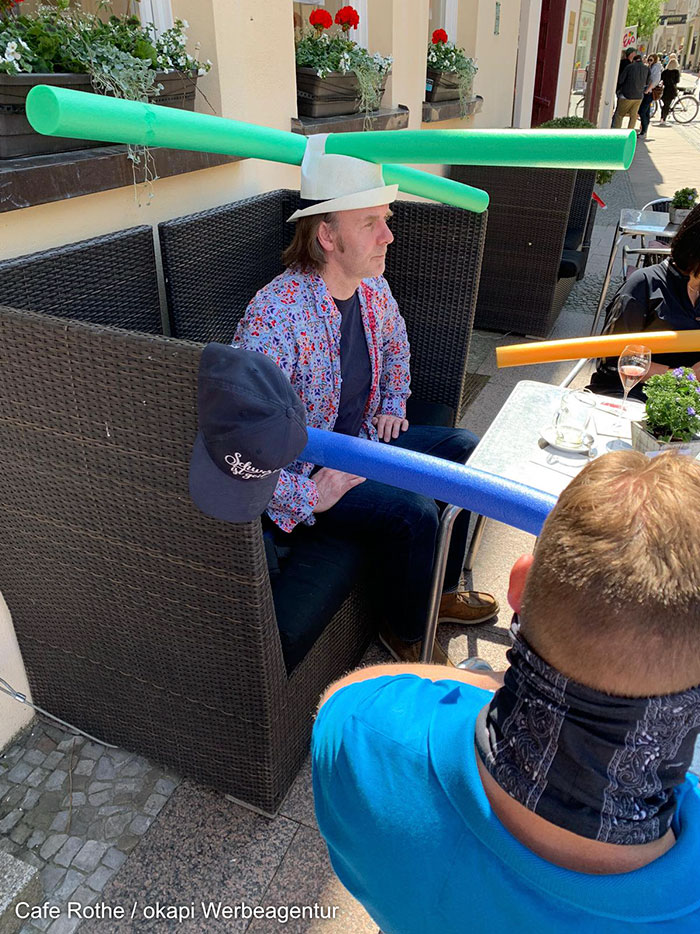 Cafe In Germany Gives Customers Hats With Pool Noodles To Keep Them Apart Cafe In Germany Gives Customers Hats With Pool Noodles To Keep Them Apart