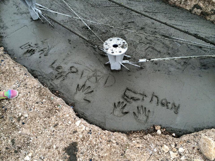 This Dad Should Win An Award For Building An Incredible 14-Meter Dinosaur Jungle Gym For His Kids