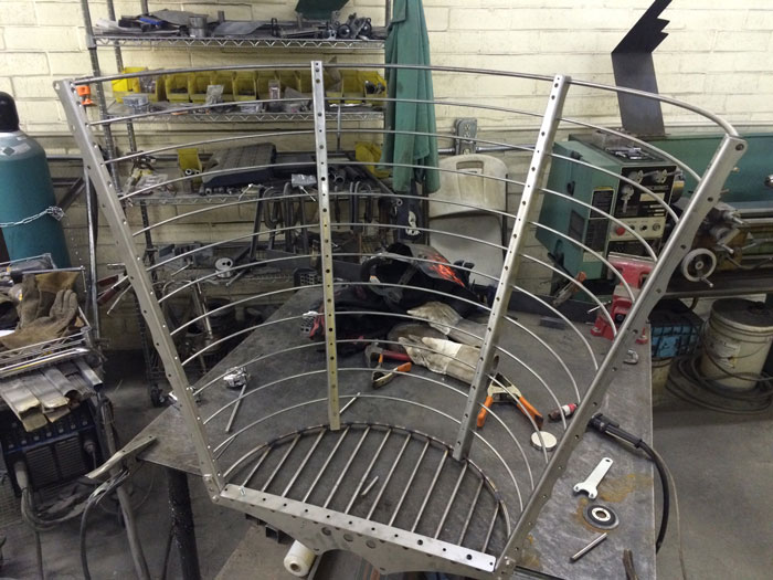 This Dad Should Win An Award For Building An Incredible 14-Meter Dinosaur Jungle Gym For His Kids