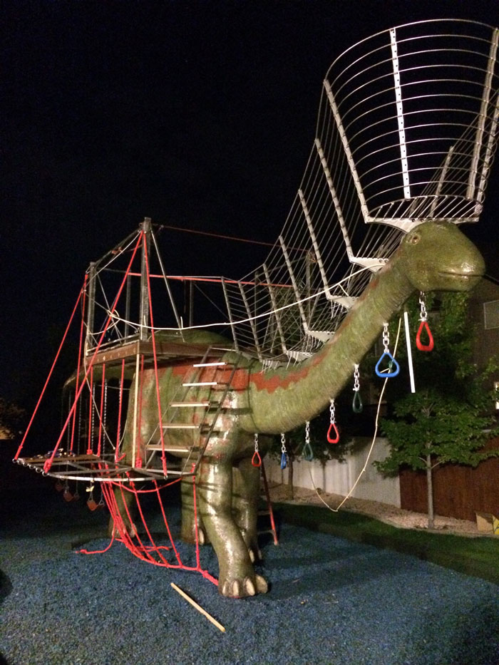 This Dad Should Win An Award For Building An Incredible 14-Meter Dinosaur Jungle Gym For His Kids