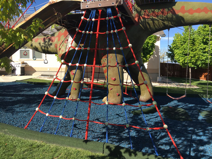 This Dad Should Win An Award For Building An Incredible 14-Meter Dinosaur Jungle Gym For His Kids