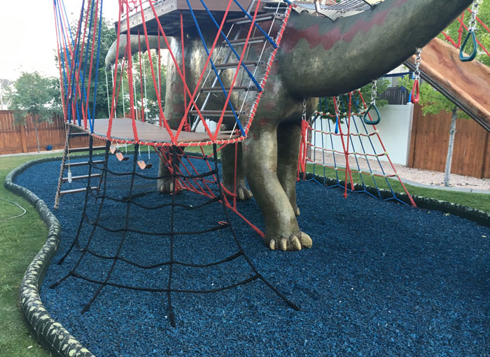 This Dad Should Win An Award For Building An Incredible 14-Meter Dinosaur Jungle Gym For His Kids