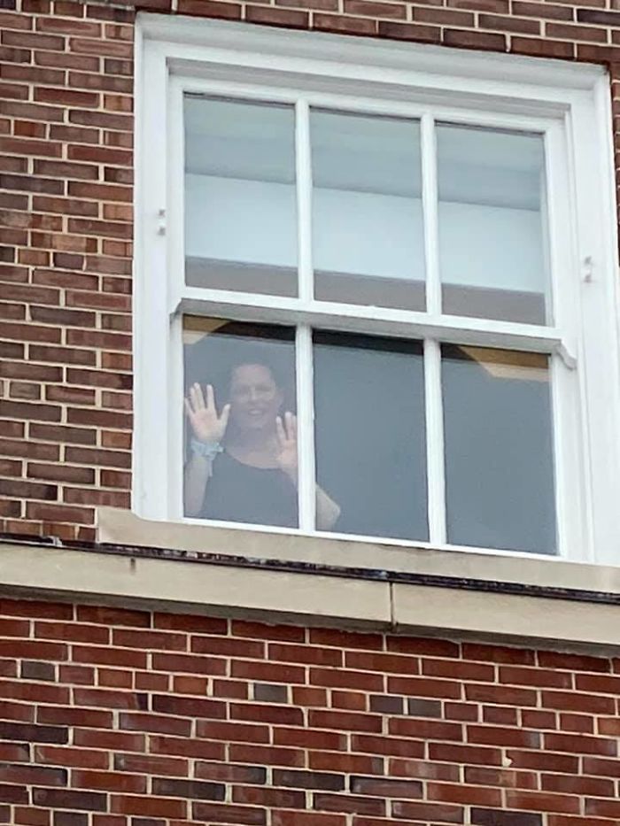 Husband Sets Up Weekly Date Nights Outside Hospital Window As His Wife Waits To Give Birth