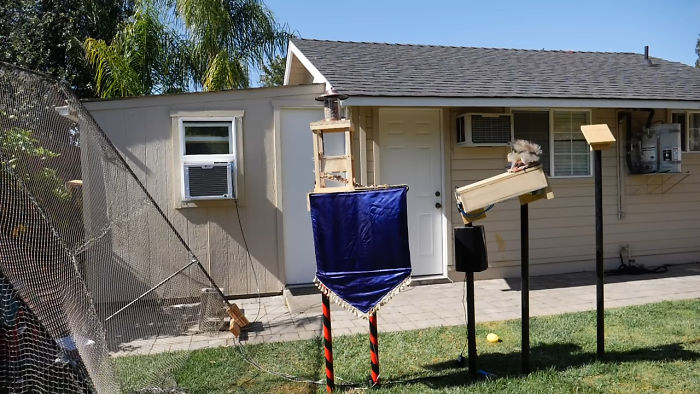 Former NASA Engineer Builds The Perfect Squirrel-Proof Bird Feeder And Watches Them Battle For The Treats