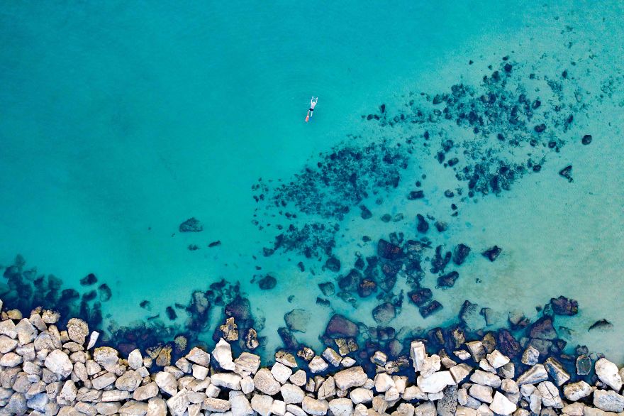 A Lone Swimmer At Gordon Beach