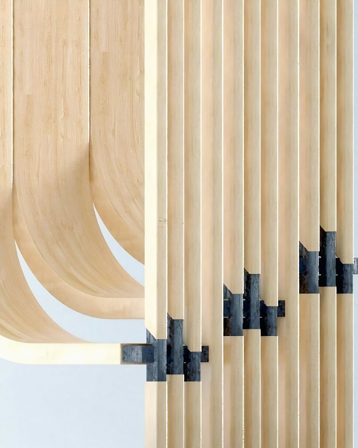 This Minimalistic Staircase Resembles A Strand Of DNA Inside Of A Two-Story Home