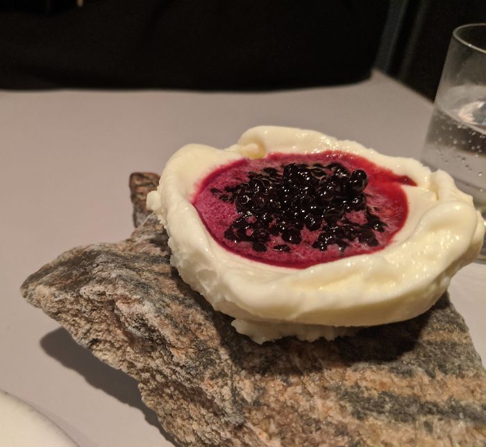 Sauce In A Cup Of Ice Cream On A Rock. Better Eat It Fast