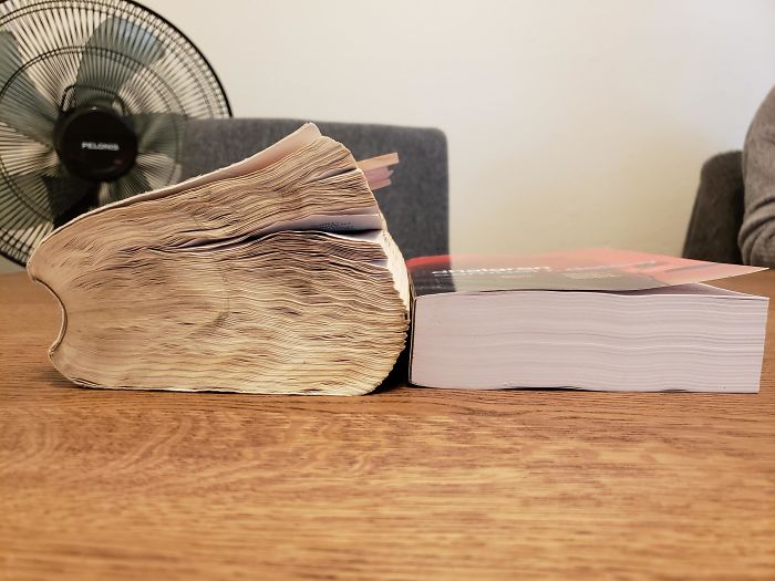 Same Exact Book, One Used And Rained On, One Brand New