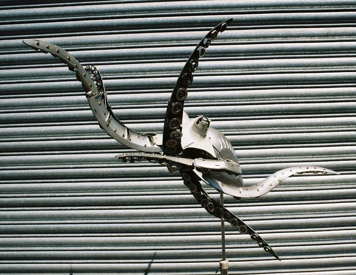 This Artist Recycles Car Hubcaps To Create Amazing Animal Sculptures (New Pics)