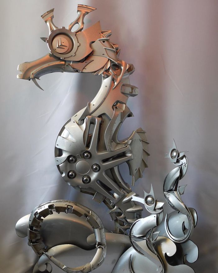 This Artist Recycles Car Hubcaps To Create Amazing Animal Sculptures (New Pics)