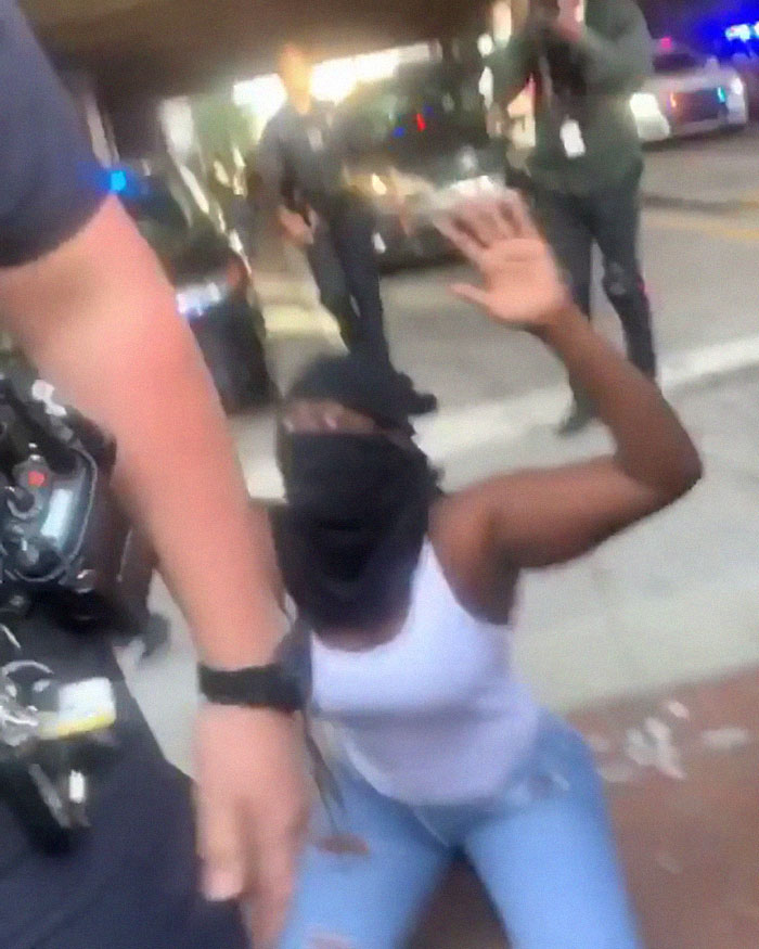 After A Cop Pushed A Kneeling Woman, Black Female Police Officer Stands Up For Her