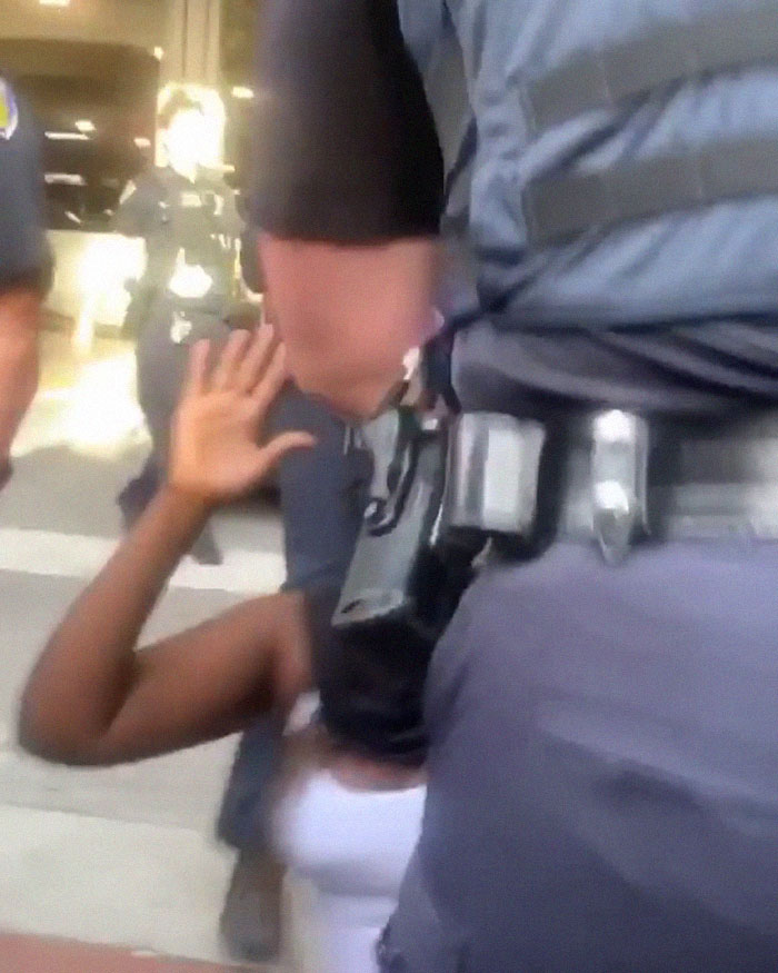 After A Cop Pushed A Kneeling Woman, Black Female Police Officer Stands Up For Her After A Cop Pushed A Kneeling Woman, Black Female Police Officer Stands Up For Her