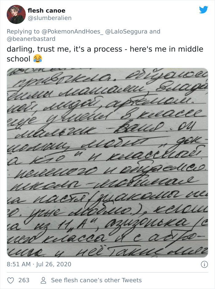 Russian cursive handwriting example in a notebook, demonstrating complex and flowing script style.