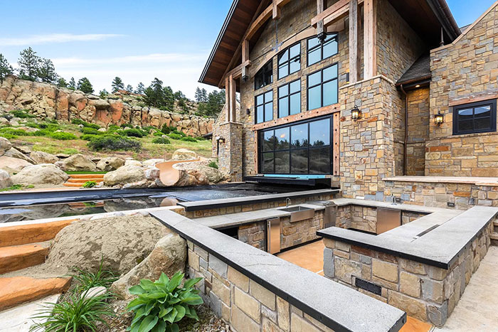 This Majestic 30,843-Square-Foot 'Castle' Sells For $13.95 Million And It Even Has A Fitness Center And Indoor Shooting Range