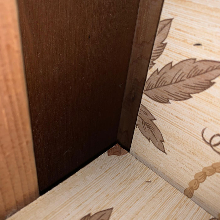 Family Found Strange 40 Y.O. 'Treasure' In Their Wall That Had Piled Up Through A Secret Hole In Their Cabinet