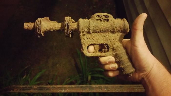 Found In The Woods Behind My House... Definitely Not A Real Gun, But I Haven't The Foggiest Of What It Might Be. Based On The Rust And The Fact That I've Lived Here For 22 Years, It Has To Be At Least 30+ Years Old... I'm Thinking Maybe Even 50+