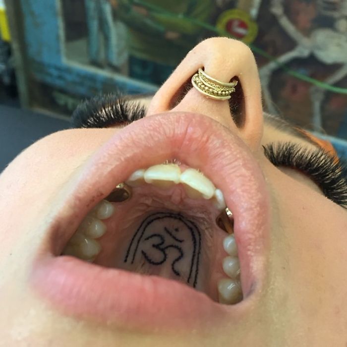 Tattoo on the roof of the mouth featuring a unique design, showcasing unconventional body art placement.