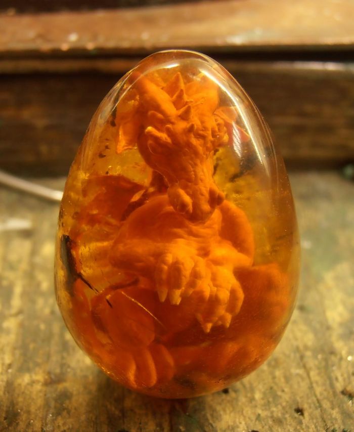 I Split A 30mm Amber Egg, Reverse Engraved A Miniature Dragon In It And Put It Back Together.