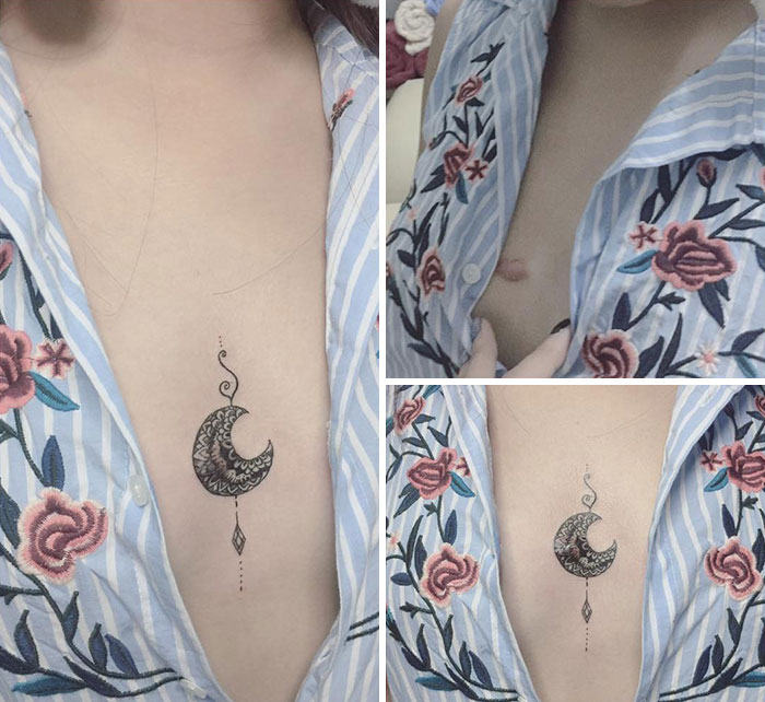 Tattoo art covering scars with a crescent design on a person wearing a floral shirt.