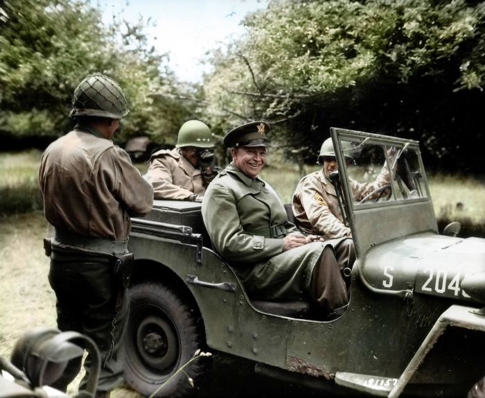 General Bradley Laughing Together With General Eisenhower, While Seated In A Jeep In A Normandy Orchard, Sometime After Operation Overlord Of '44, Probably Early Fall Judging By The Heavier-Than-Usual Clothes
