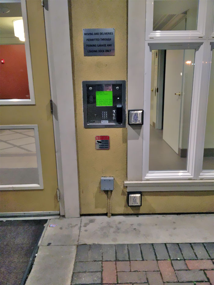 Door With Normal And Foot Height Wheelchair Door Buttons