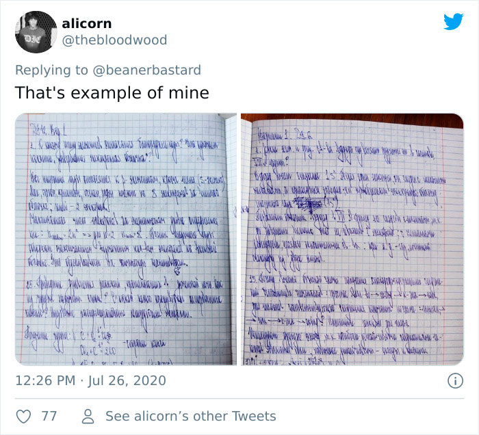 Handwritten Russian cursive notes in blue ink on grid paper, demonstrating complex and dense cursive writing style.