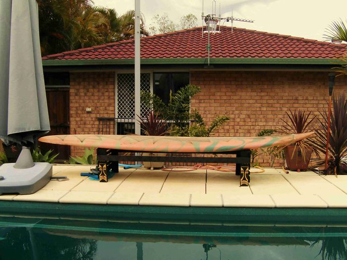 Tiki Themed Poolside Bench Made From Junkyard Sourced Windsurfer Board