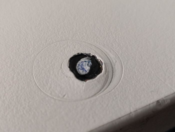 The Hole In This Table Looks Like Earth Seen From Space