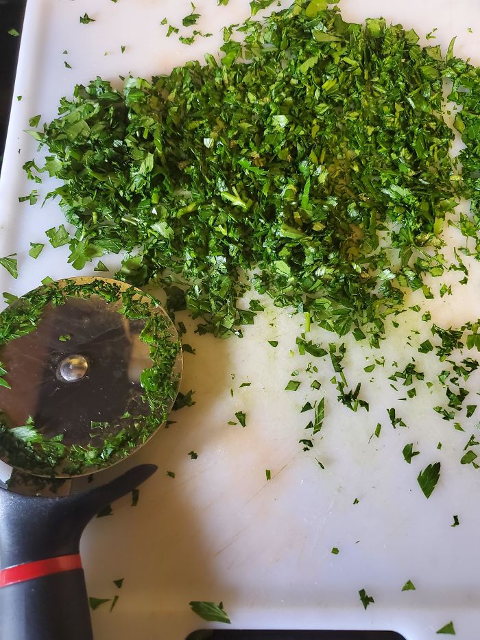 Use A Pizza Wheel To Make Easy Work Out Of Herbs