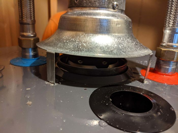 The Inside Of This Water Heater Flue Looks Like Cat Eyes.