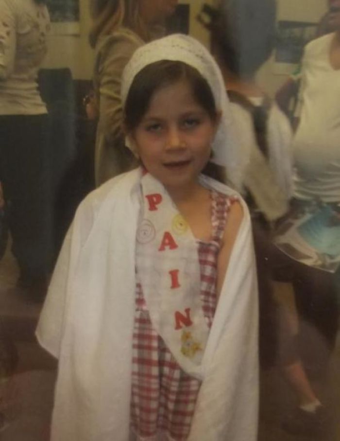 The Sash Was Supposed To Say "Spain"