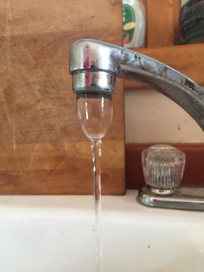 Water From Faucet Looks Like A Wine Glass