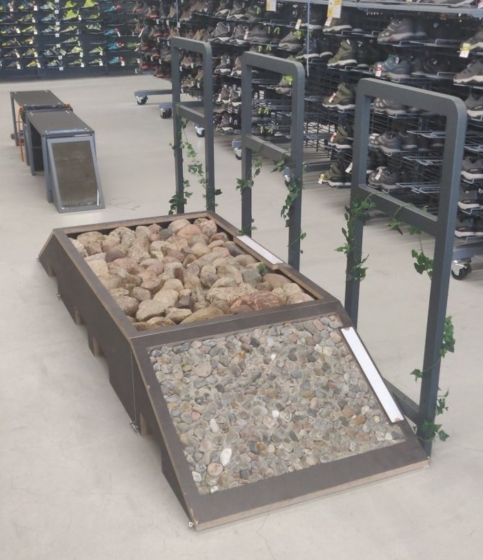 This Sports Store Has A Ramp With Different Types Of Terrain To Test Hiking Shoes