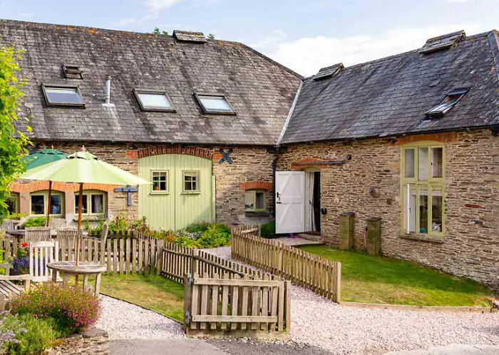 What Is This X-Shape On The Wall, Often Seen Around Old Farms/Barns/Stables?