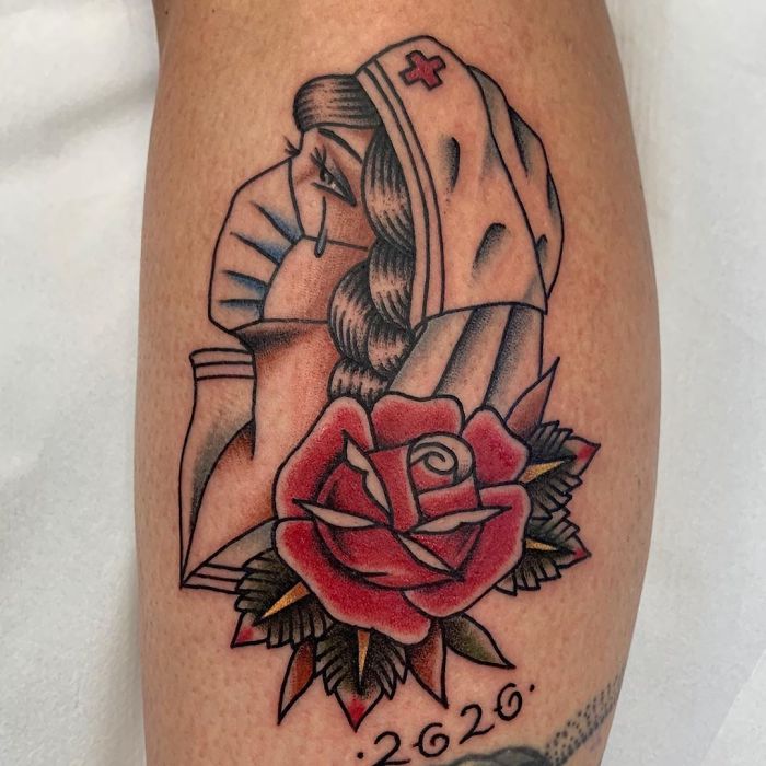 Creative Covid-19 tattoo of a nurse with a face mask and a red rose, dated 2020.