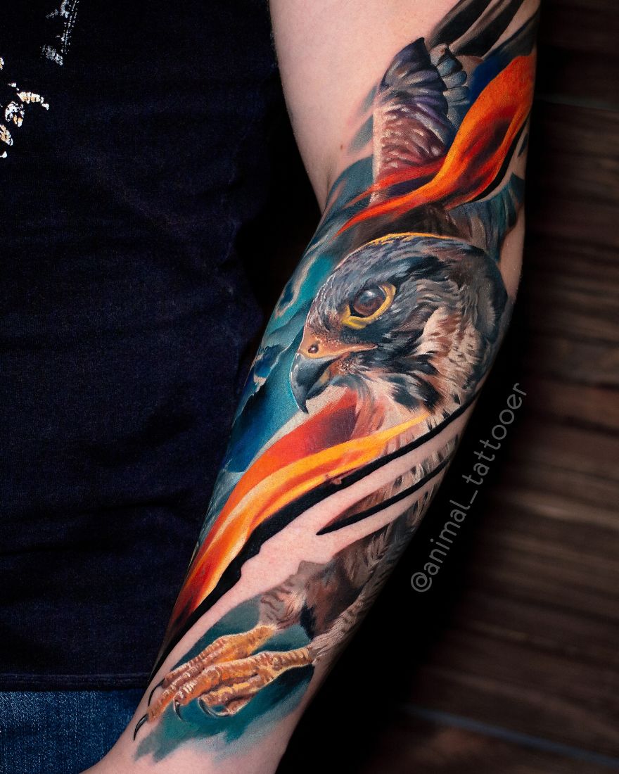 Colorful and bright animal tattoo of a bird on a person's forearm.