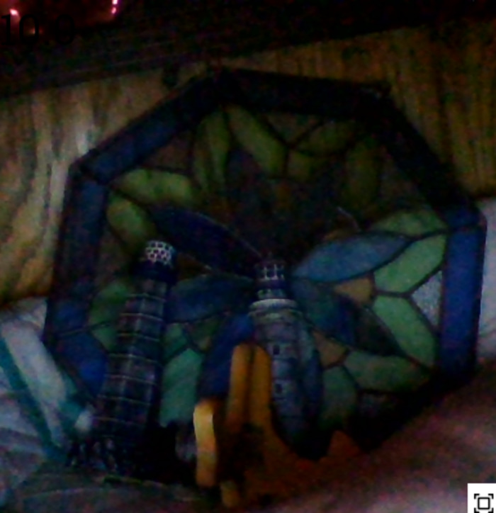 Two Mini Lighthouses, A Stained Glass Artwork Thing And What I Assume To Be A Bookend (They All Came With The House)