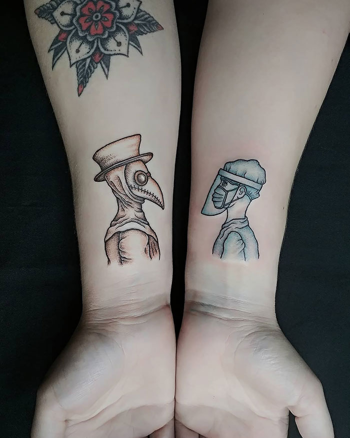 Creative Covid-19 tattoos on forearms, featuring a plague doctor and a masked healthcare worker facing each other.