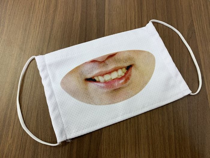 Japanese Shop Launches 'Smile Masks' To Make Customers Think That The Staff Is More Friendly