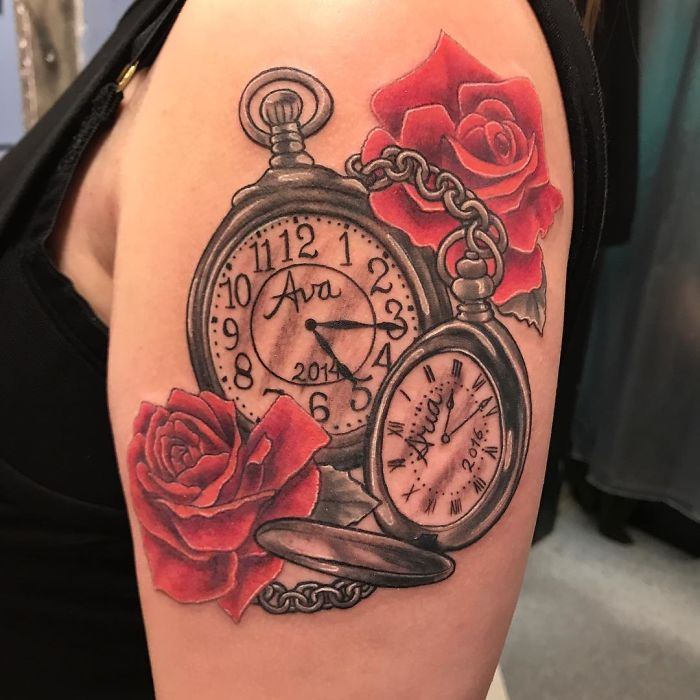 Pocket watch and rose tattoo on upper arm, a popular design requested by many.